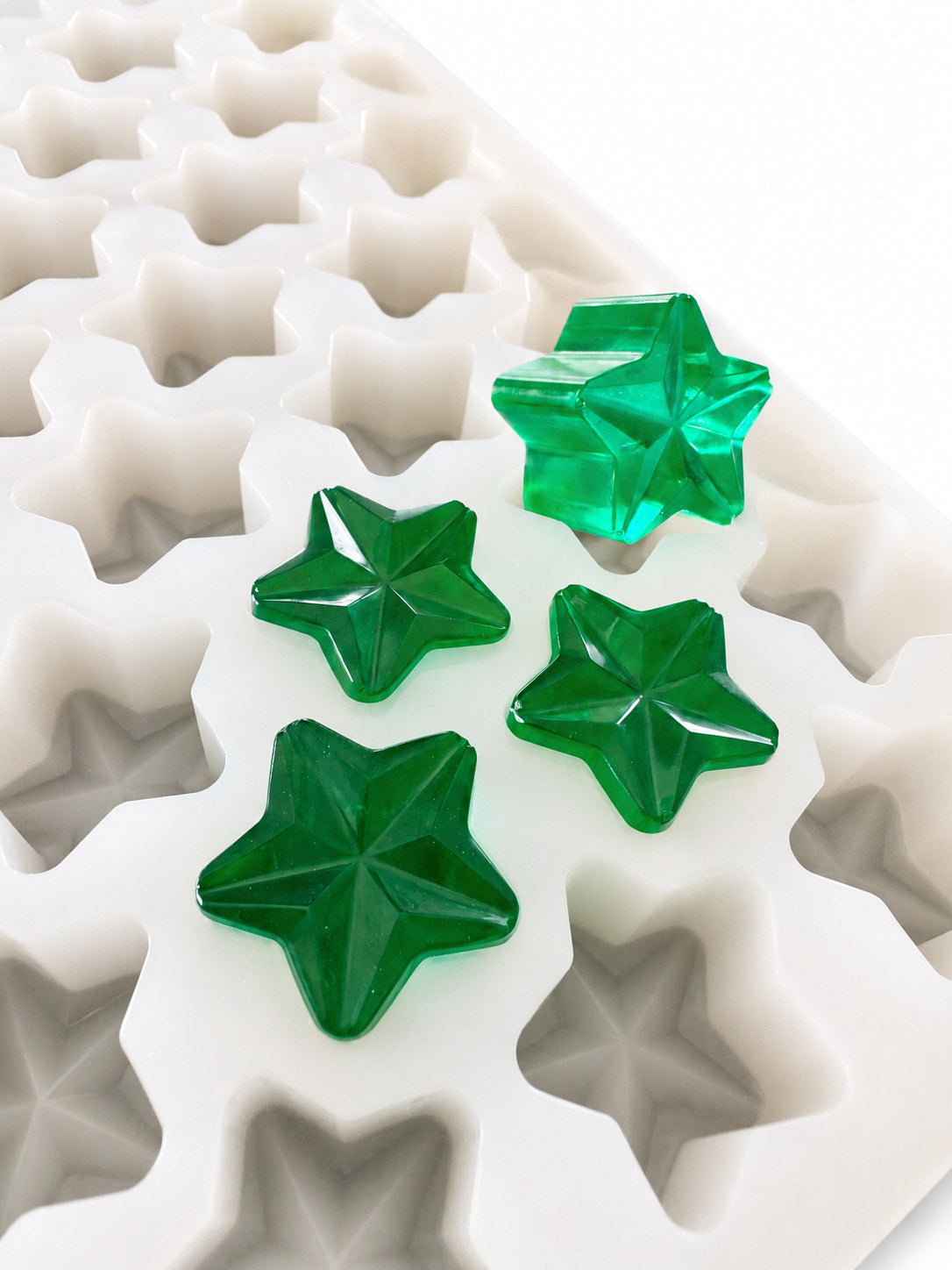 2mL star silicone gummy mold with 219 cavities and emerald green gummy samples