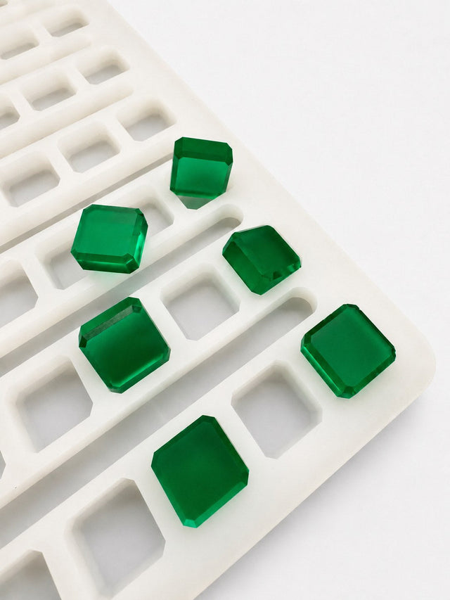 Gummiformar för universaldepositor