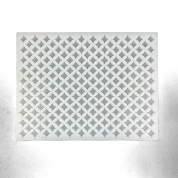 Full horizontal top view of an empty 2mL star gummy mold with 192 cavities on a white background