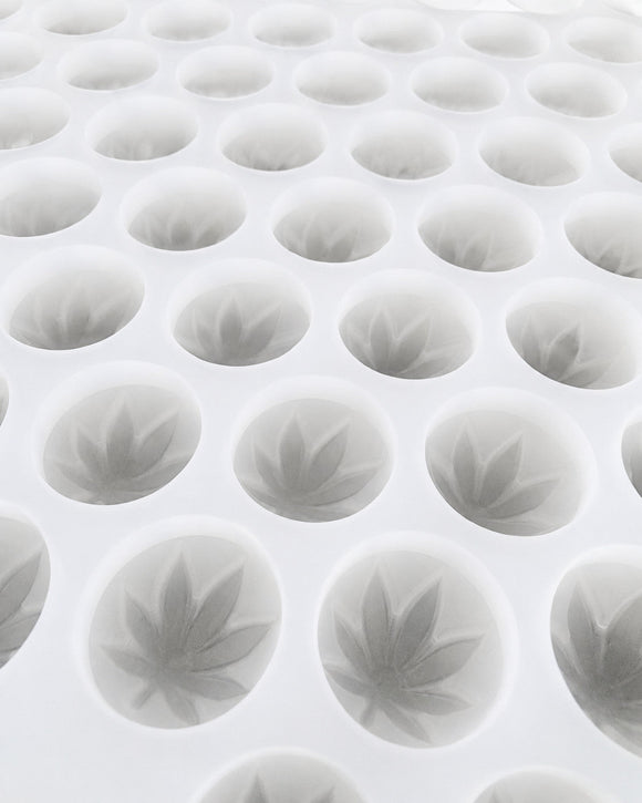 Close-up of the leaf-shaped cavities in a 3.1mL silicone gummy mold