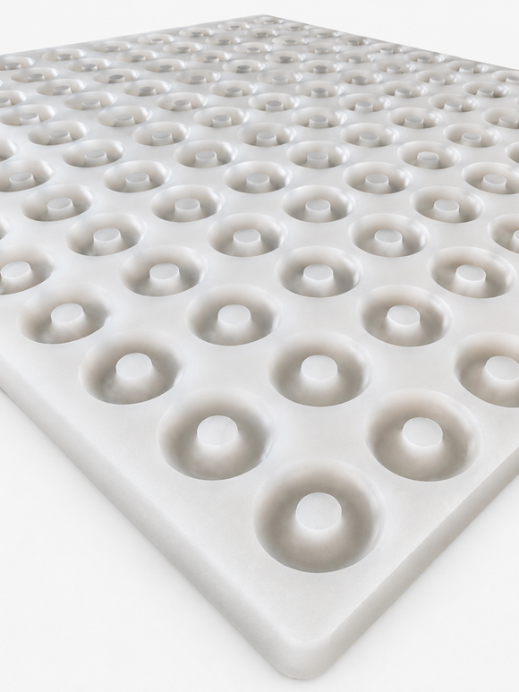 Close-up of 3.4mL peach ring gummy mold cavities
