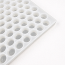 Close-up of an empty 3mL gumdrop gummy mold with 262 cavities on a white background